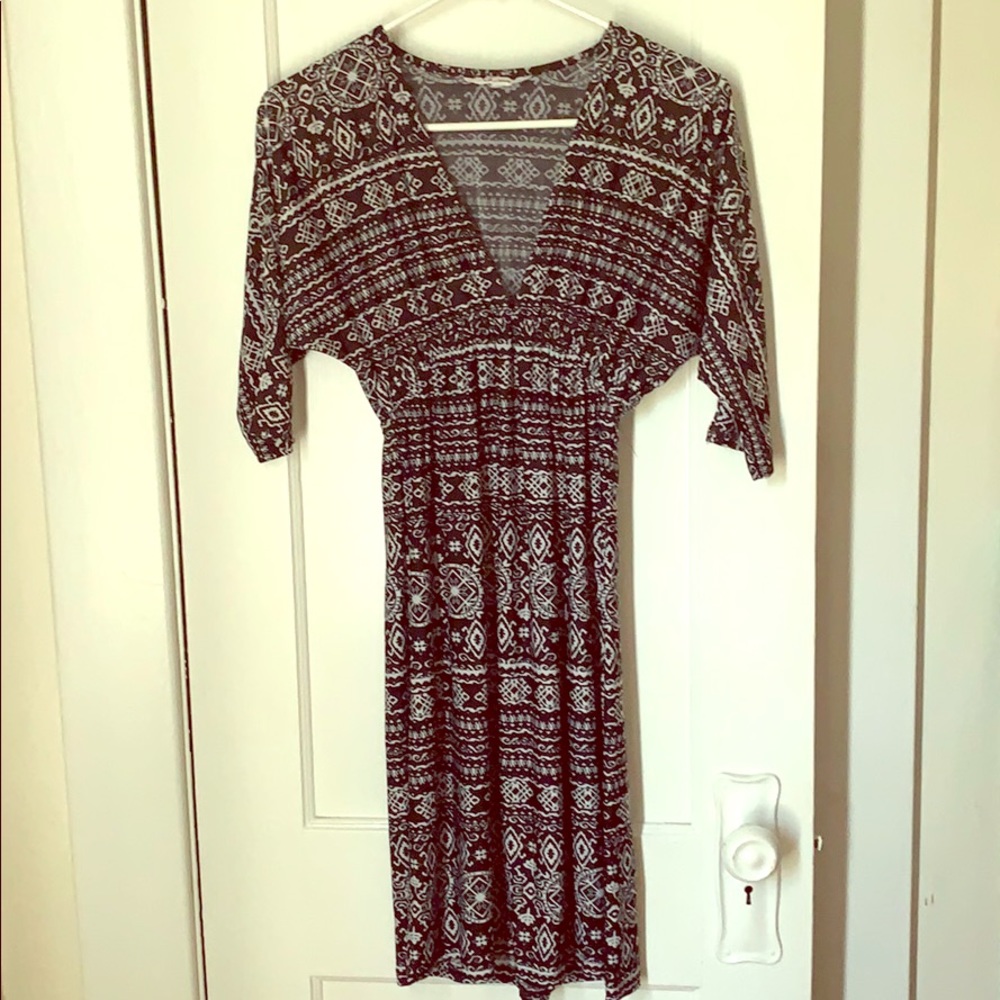 Knee length dress.